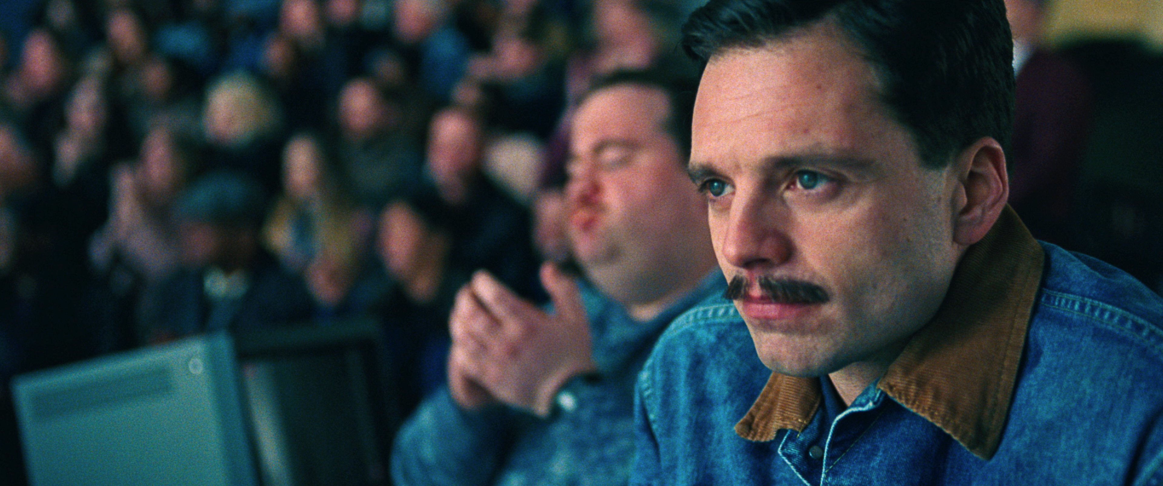 2- Jeff Gillooly (Sebastian Stan) watches a routine in I, TONYA, courtesy of NEON and 30WEST