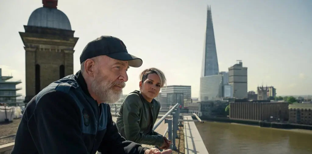 Halle Berry as Roxanne Hall, J.K. Simmons as Tom Brennan in 'The Union' with The Shard in London filmed in the background