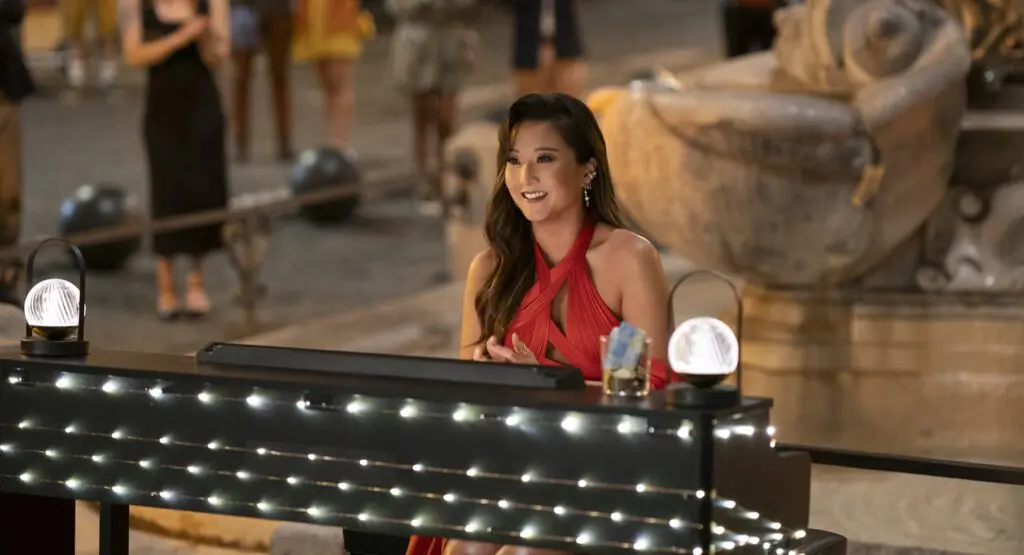 Ashley Park as Mindy in Emily in Paris Season 4, Episode 10