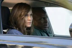 Pictured: (l-r) Amy Brenneman as Zoe McDonald, Gbenga Akinnagbe as Julian Carson.