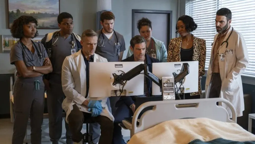 The entire gang assembles to see the outcome of Roman's surgery