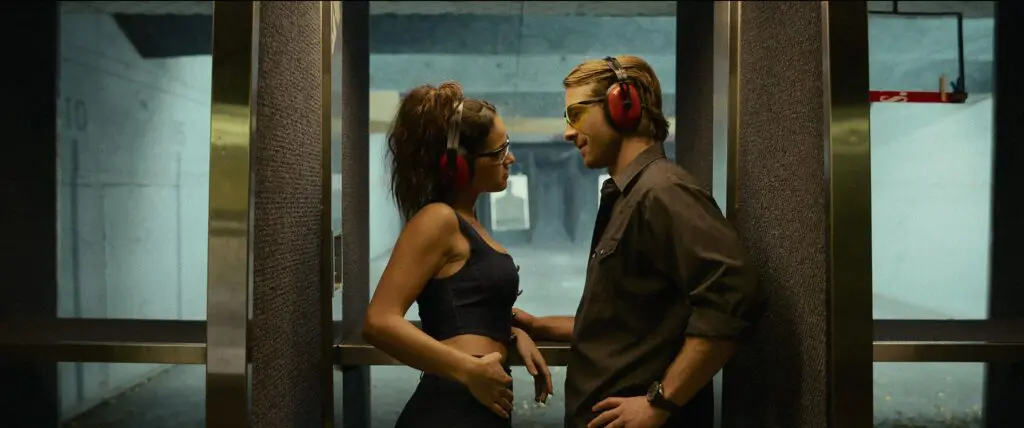 Adria Arjona as Madison and Glen Powell in Hit Man on Netflix as part of a review and ending explanation