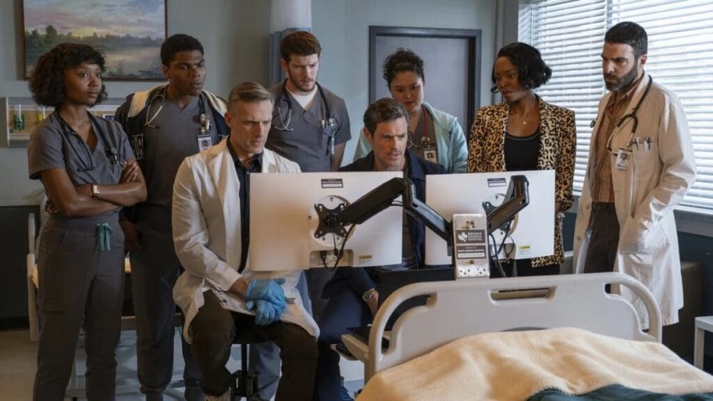 The entire gang assembles to see the outcome of Roman's surgery