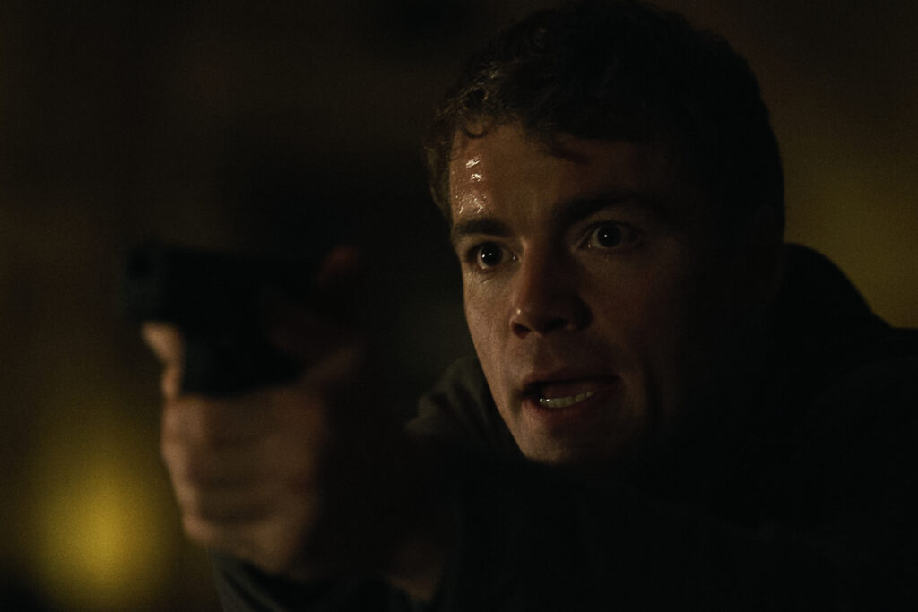 Gabriel Basso as Peter Sutherland in episode 201 of The Night Agent.