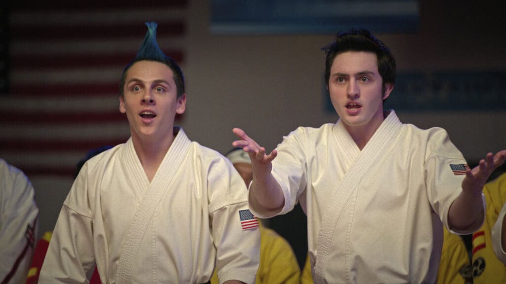 (L to R) Jacob Bertrand as Eli 'Hawk' Moskowitz, Gianni DeCenzo as Demetri in Cobra Kai.