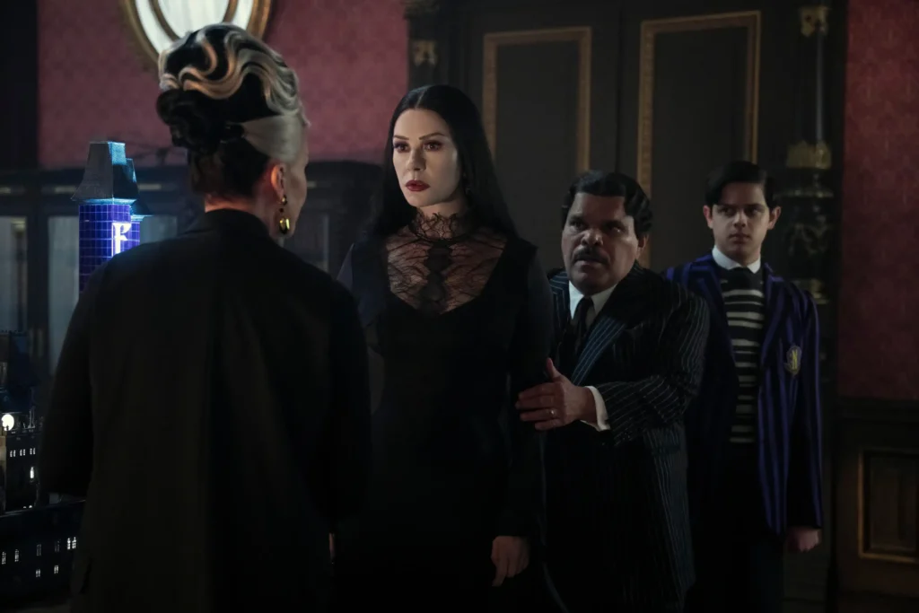 (L to R) Joanna Lumley as Grandmama, Catherine Zeta-Jones as Morticia Addams, Luis Guzma?n as Gomez Addams, Isaac Ordonez as Pugsley Addams in Wednesday.