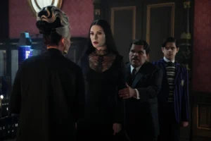 (L to R) Joanna Lumley as Grandmama, Catherine Zeta-Jones as Morticia Addams, Luis Guzma?n as Gomez Addams, Isaac Ordonez as Pugsley Addams in Wednesday.