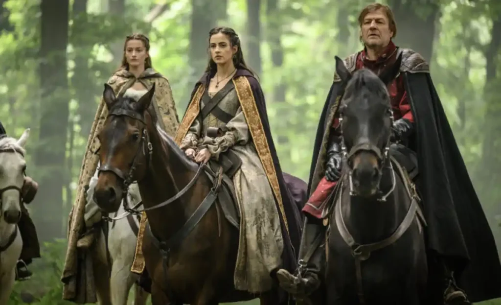 A still from MGM+'s Robin Hood including Lydia Peckham and Sean Bean