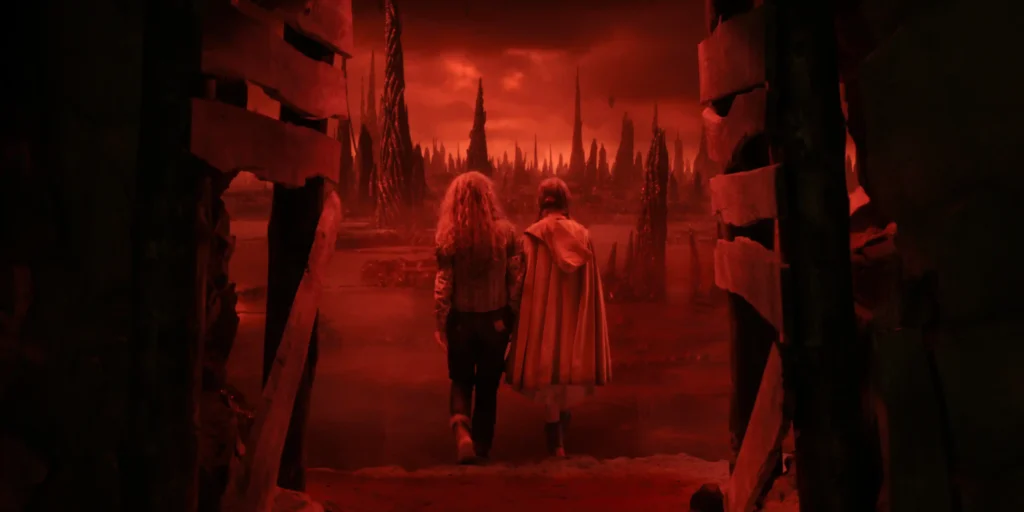 (L to R) Sadie Sink as Max Mayfield and Nell Fisher as Holly Wheeler in Stranger Things: Season 5.