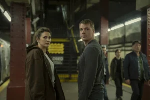 (L to R) Michaela Watkins as Freya, Gabriel Basso as Peter Sutherland in episode 310 of The Night Agent.