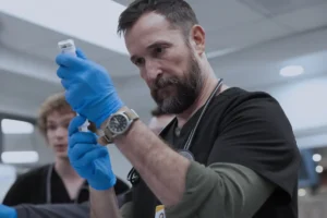 Lucas Iverson and Noah Wyle in The Pitt Season 2