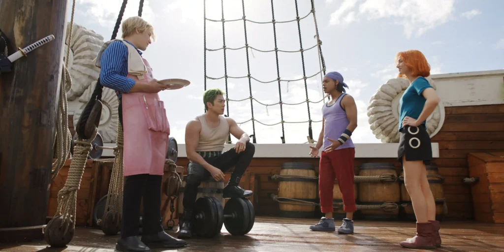 (L to R) Taz Skylar as Sanji, Mackenyu as Roronoa Zoro, Jacob Romero as Usopp, Emily Rudd as Nami in season 2 of One Piece
