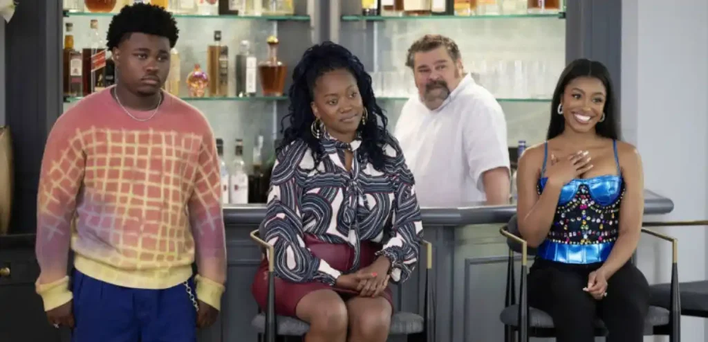 (l-r) Jalyn Hall as Carmelo, Erika Alexander as Monica, Bobby Moynihan as Rusty Boyd, Precious Way as Brina