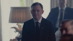 A still image of Nate Corddry as Commander Mackenzie in The Testaments