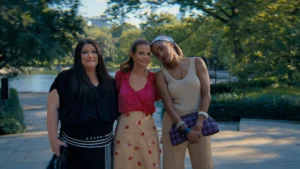 Dana Sue, Maddie, and Helen standing closely together and smiling in Sweet Magnolias Season 5