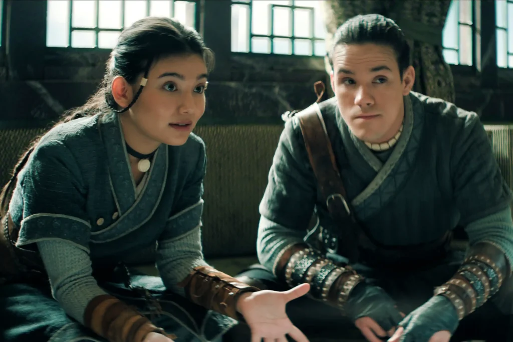 (L to R) Kiawentiio Tarbell as Katara, Ian Ousley as Sokka in season 2 of Avatar: The Last Airbender