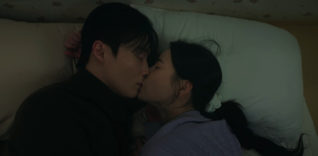 Cha Se-gye and Shin Seo-ri sharing an emotional, intimate kiss while lying down in a scene from My Royal Nemesis