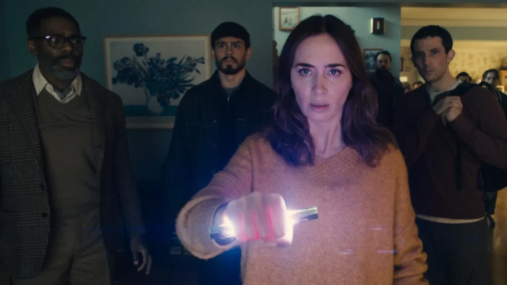 Emily Blunt as Margaret in Disclosure Day holding a glowing sci-fi crystal object