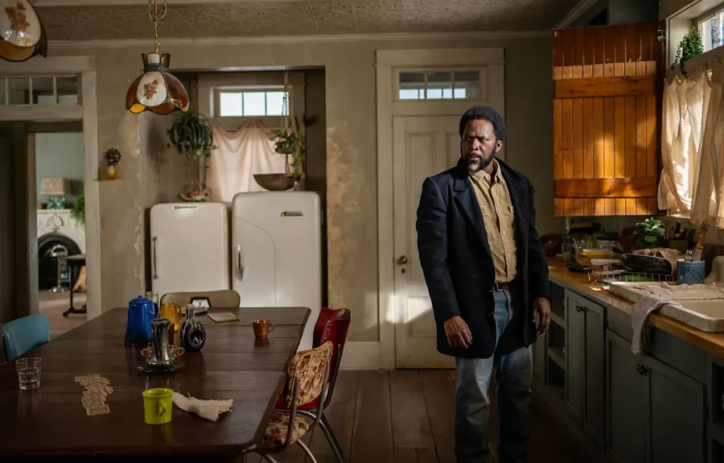 Harold Perrineau as Boyd Stevens looking anxious in a kitchen in From Season 4
