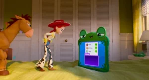 Jessie and Bullseye looking at the Lilypad tablet device in a scene from Pixar's Toy Story 5