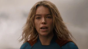 Milly Alcock as Kara / Supergirl in the 2026 film looking slightly distressed and concerned
