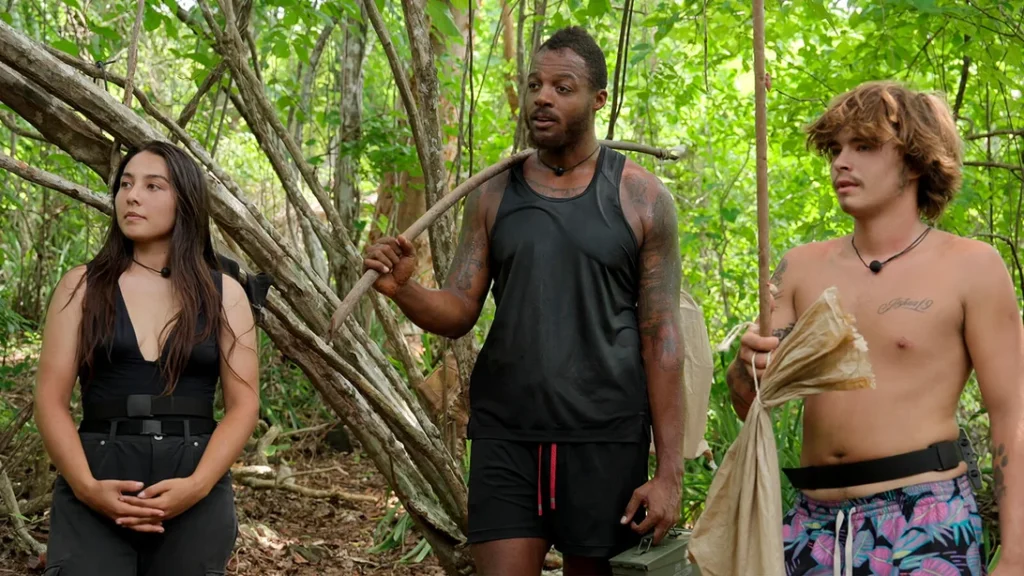 Leiya Pillitteri, Wes Saunders and Braxton Fish standing together in Team Charlie in Outlast: The Jungle (Season 3)