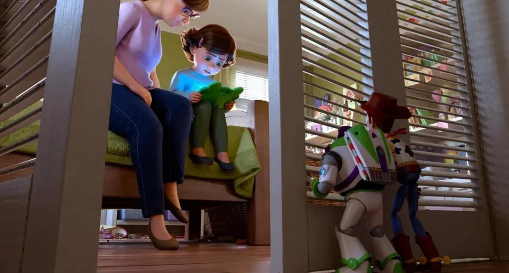 Buzz Lightyear and Woody peer out from a closet door watching Bonnie and her mom look at a tablet screen in Toy Story 5