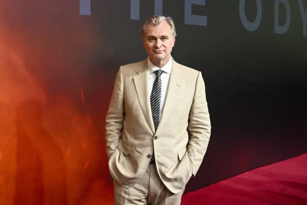 Christopher Nolan at 'The Odyssey' premiere on a red carpet