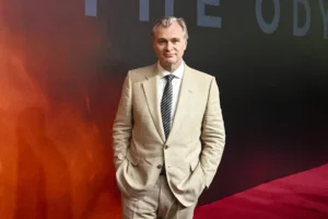 Christopher Nolan at 'The Odyssey' premiere on a red carpet