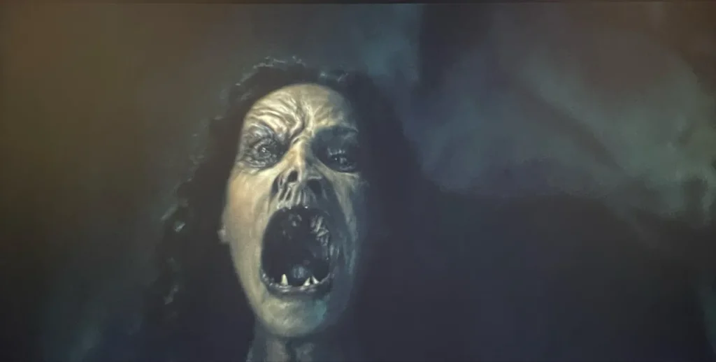 Close-up of Fatima from the TV series From, completely transformed into a creature