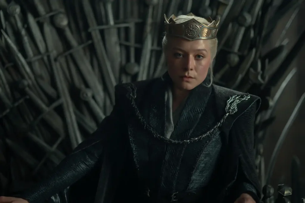Emma D'Arcy sitting the Iron Throne as Rhaenyra Targaryen in House of the Dragon Season 3