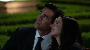 Colin Farrell as John Sugar and Laura Donnelly as Charlotte looking up at the sky together in Sugar Season 2